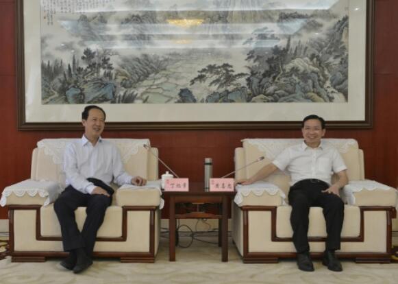 丁焰章拜會南昌市委副書記、市長黃喜忠